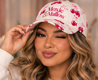 Everyday Cap |color=Cherry Daydream Print| individual AI portrait concept (enlarged lookbook crop), supplier product unverified